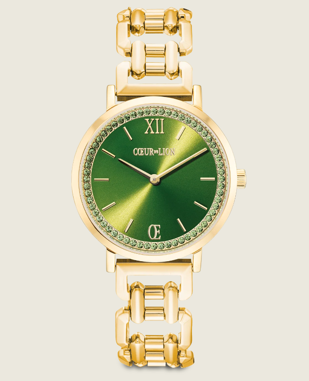 gold watch with green dial