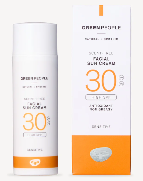 scent free facial sunscreen in white bottle