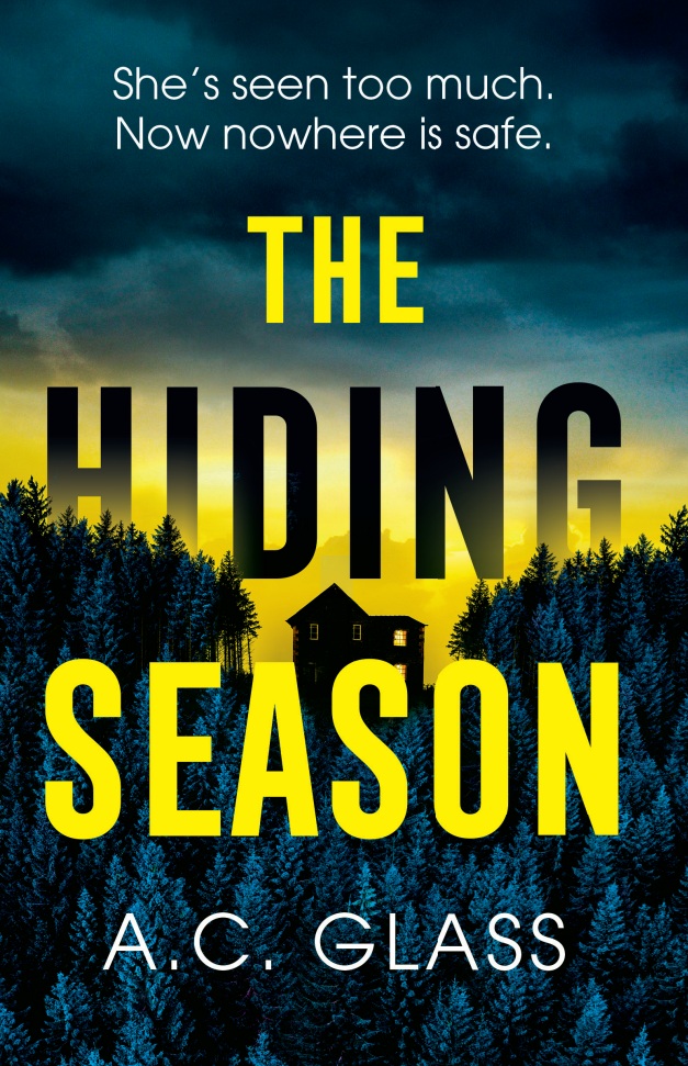 Book cover for the hiding season with yellow bold font writing and a house in the woodlands
