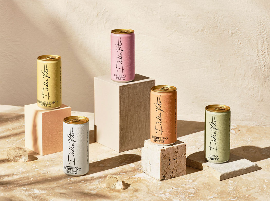 Della Vite spritz cans on a beige background