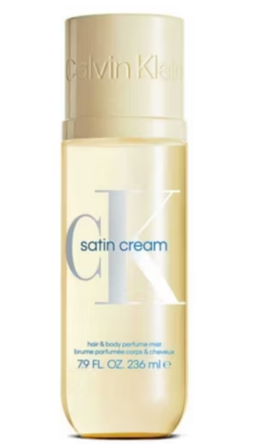 Calvin Klein body spray in yellow bottle with white writing and oversized CK logo