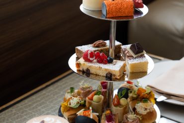 A decadent afternoon tea with three tiers