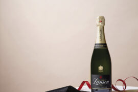 Lanson champagne styled image with red ribbon