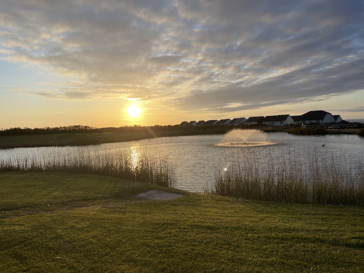 Gwel An More Cornwall view across the lake at sunset