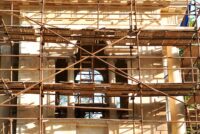 image of scaffolding on stone building