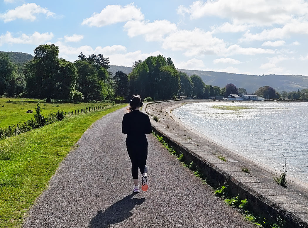 woman running by the sea