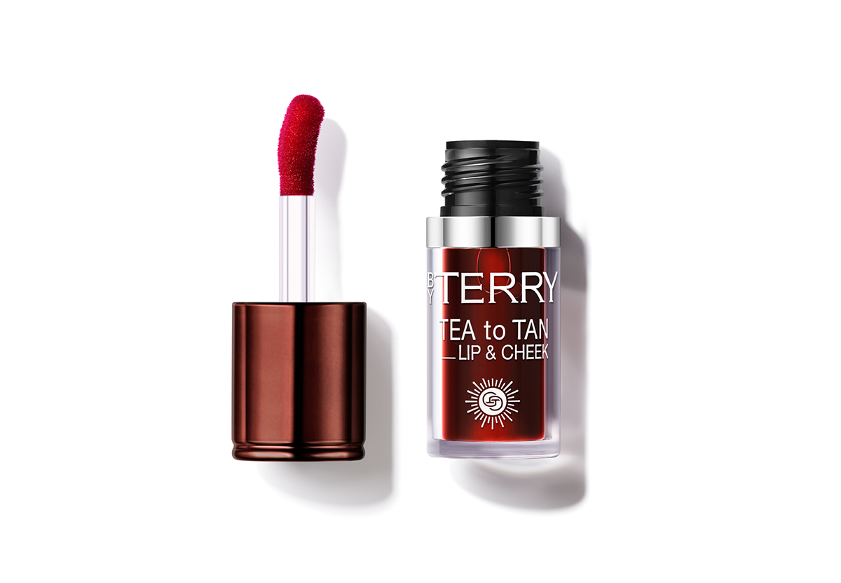 Multi functional beauty products for 2026 inclusing byterry tea to tan lip and cheek tint in red bottle with doe foot applicator